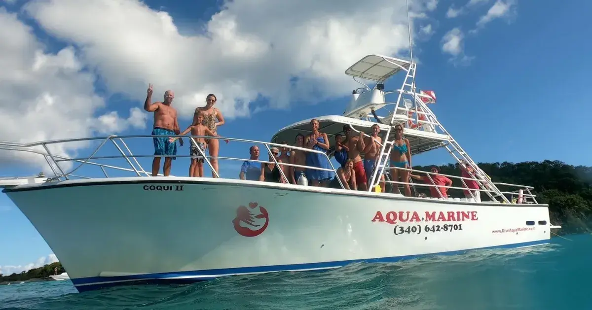 Aqua Marine Dive Center boat with divers in the crystal-clear waters of St. Thomas, US Virgin Islands