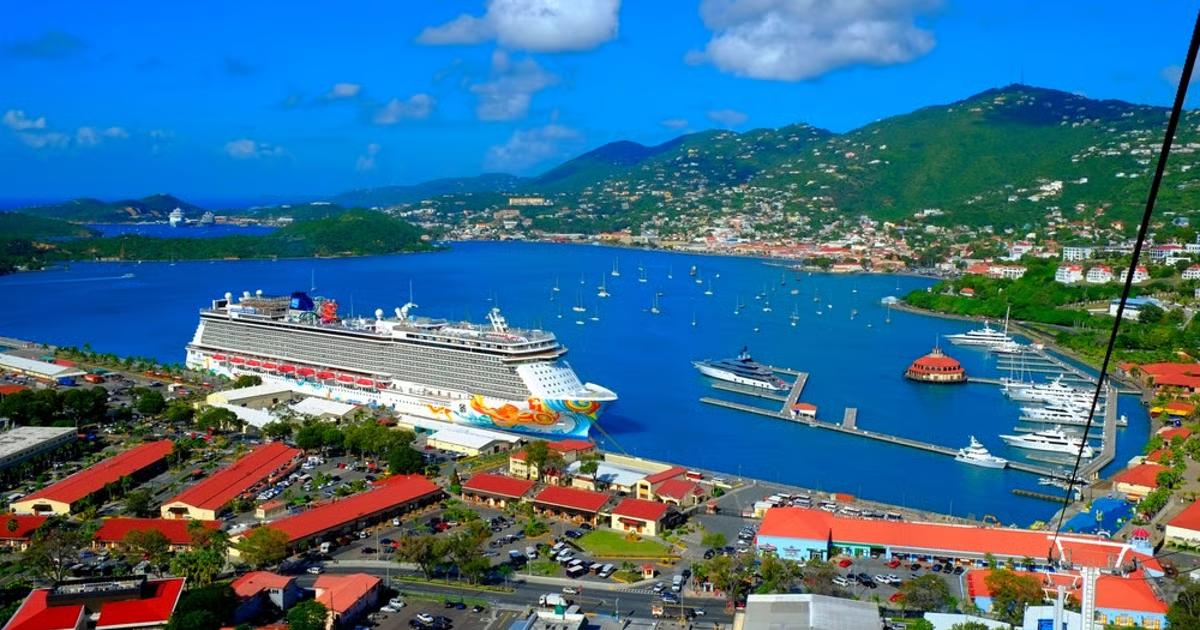Cruise ship docked at Charlotte Amalie port, St. Thomas USVI with colorful hillside buildings