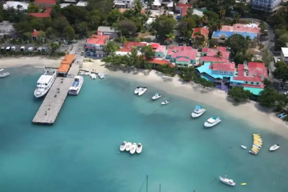 Cruz Bay Ferry Dock with charter boats and beach pickup area, St. John USVI