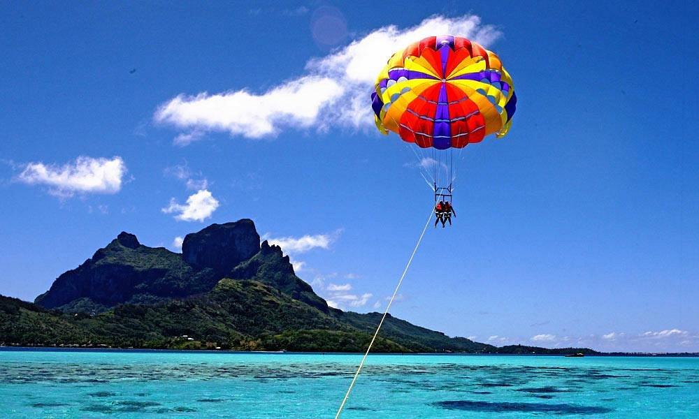 Parasailing over turquoise Caribbean waters near St. Thomas USVI