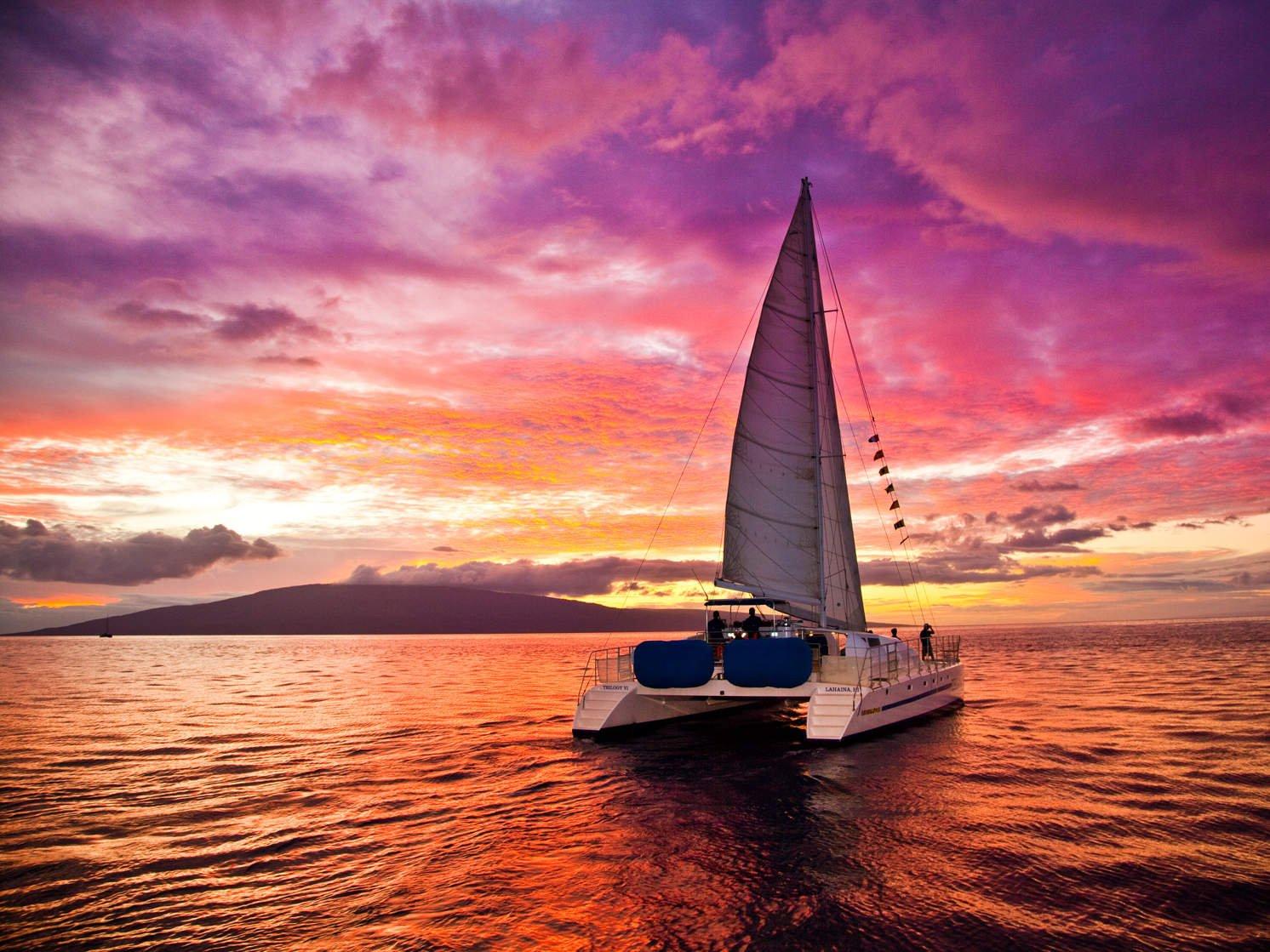 Sunset sailing from Cruz Bay, St. John with golden Caribbean sky