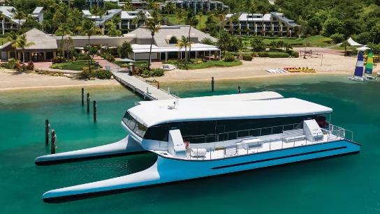 Luxury private ferry near a tropical resort dock in the US Virgin Islands