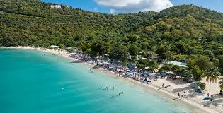 Aerial view of Magens Bay Beach St. Thomas with turquoise water and lush green hills
