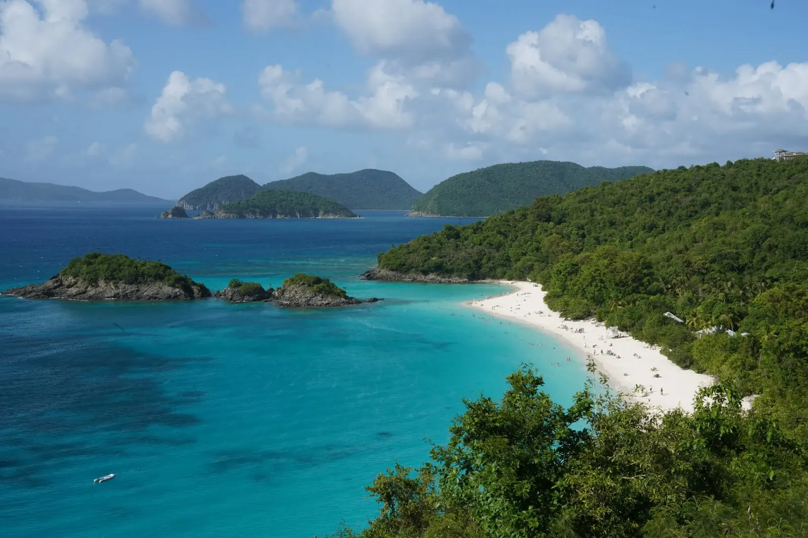 Aerial view of Trunk Bay St John with lush green hills and turquoise water